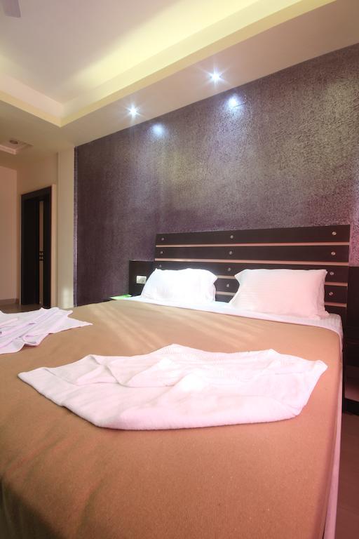 Urmee Hotel Bhubaneswar Værelse billede
