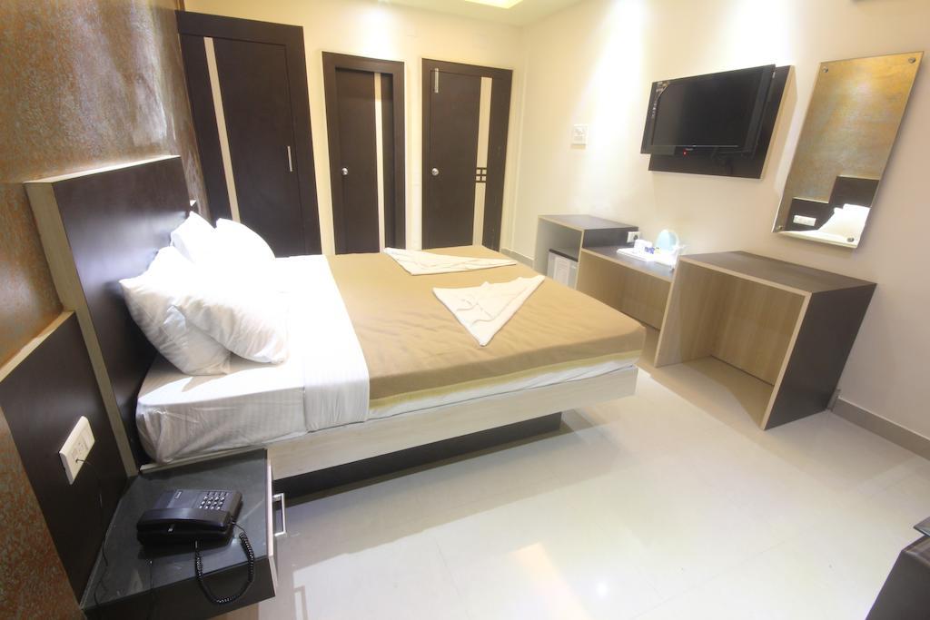 Urmee Hotel Bhubaneswar Værelse billede