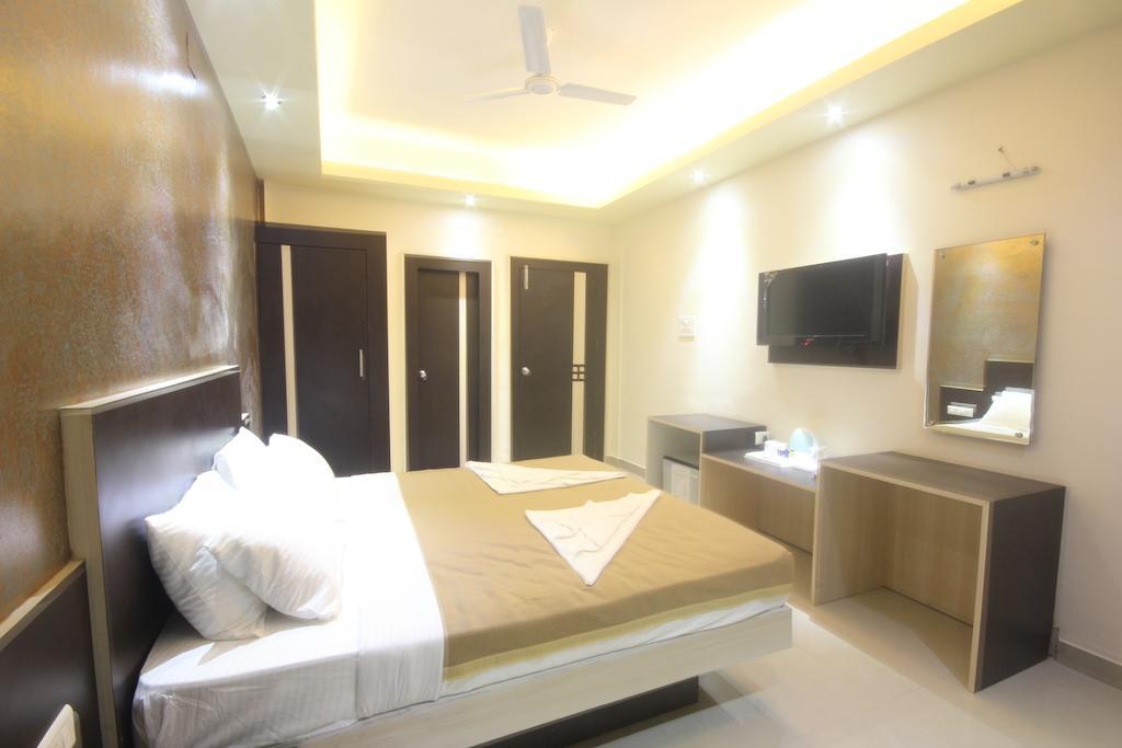 Urmee Hotel Bhubaneswar Værelse billede