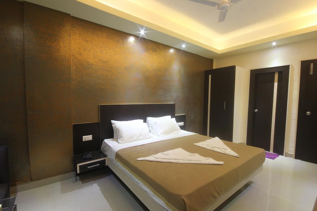 Urmee Hotel Bhubaneswar Værelse billede